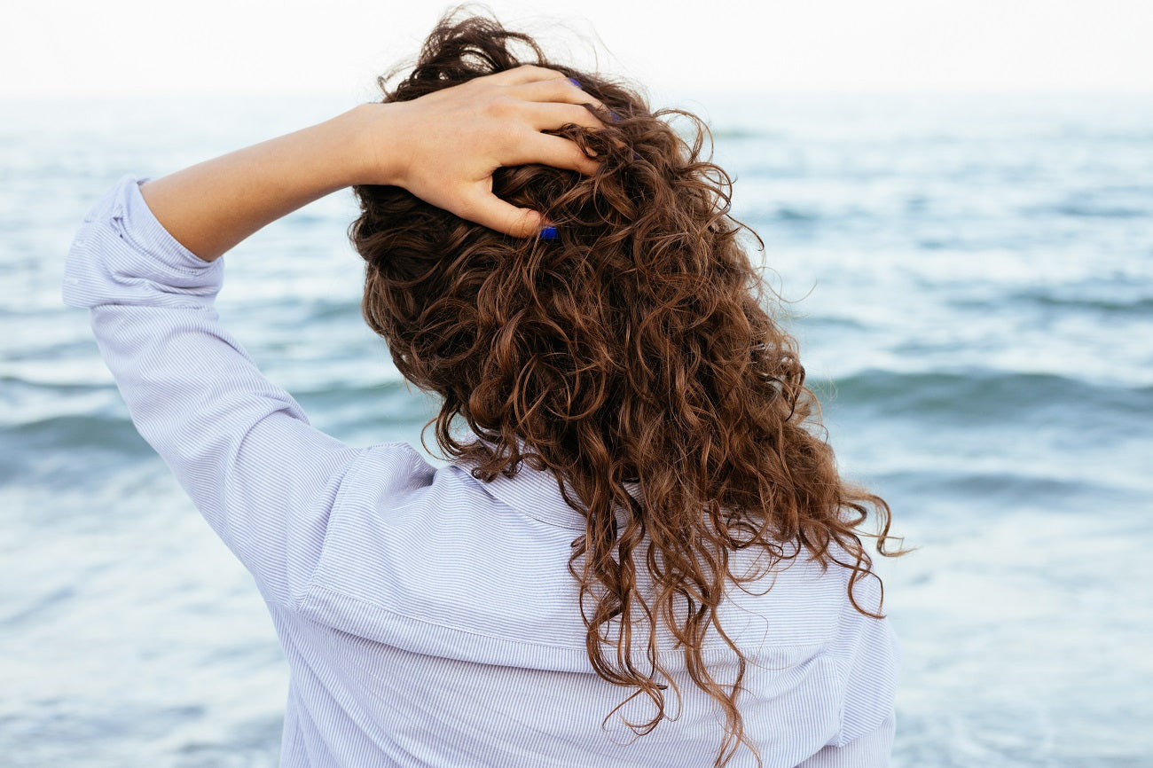 Woman with beautiful, frizz-free curls