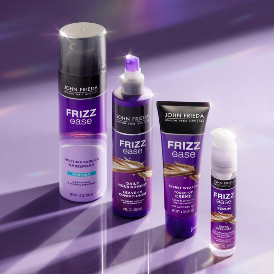 Frizz Ease Moisture Barrier Hairspray, Extra Strength Serum, Secret Weapon Touch-Up Creme, and Daily Nourishment Leave-In Conditioner.